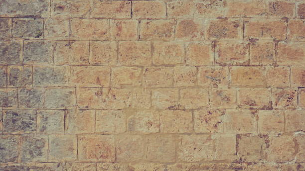 istock Grunge Stone Wall Weathered Texture. Ancient Brickwork. Distressed grungy Surface. Background Backdrop. Close Up 1422419581