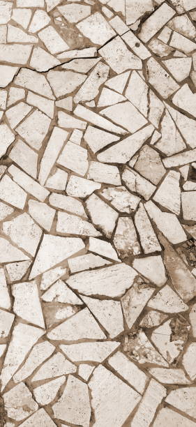 istock Broken Tiles Mosaic Pattern. Interior background. Tiled Wall. Symmetrical Banner. Sepia Style. Vertical Backdrop 1422419856