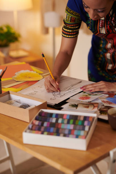 istock Fashion Designer Working on Sketches 1422420808