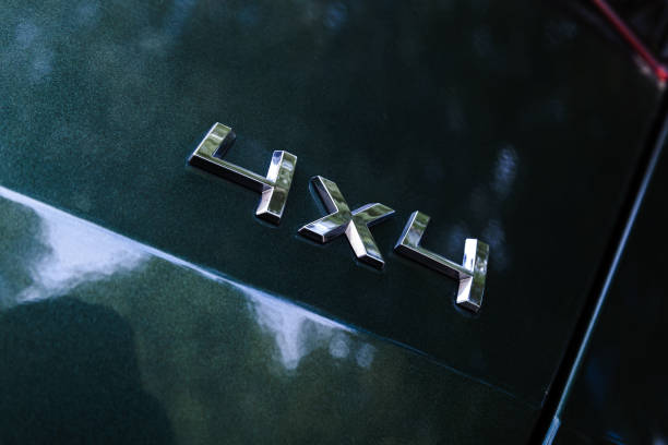 istock All wheel drive sign, shiny metallic text 4x4, close up 1422427970