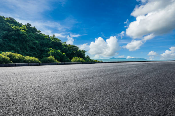 istock Road and green mountain 1422429946