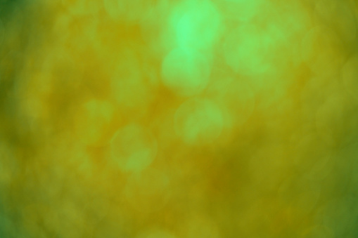 Gold and green glitter bokeh background  for background and inspiration in snow or celebrate concept with copy space
