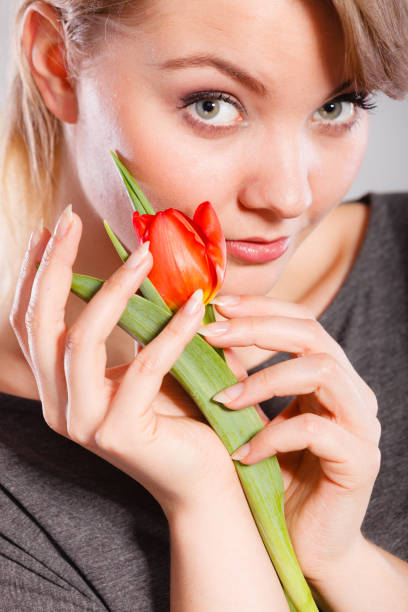 Beautiful woman with bunch of flowers in Helsingborg, Sweden