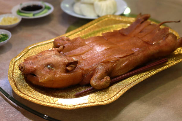 Roasted Suckling Pig, Traditional Chinese Food Served In Restaurant