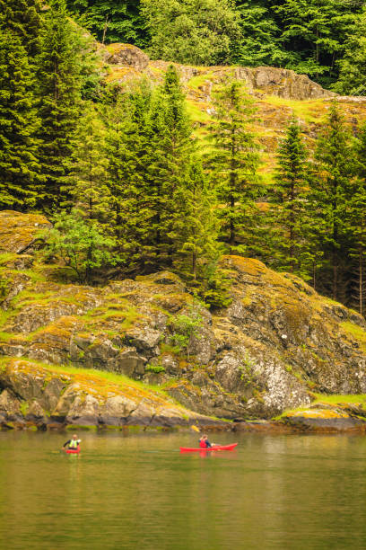 istock fjord in Norway and people kayaking 1422438489