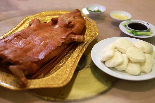 istock Barbecued Suckling Pig Served With Baozi 1422439528
