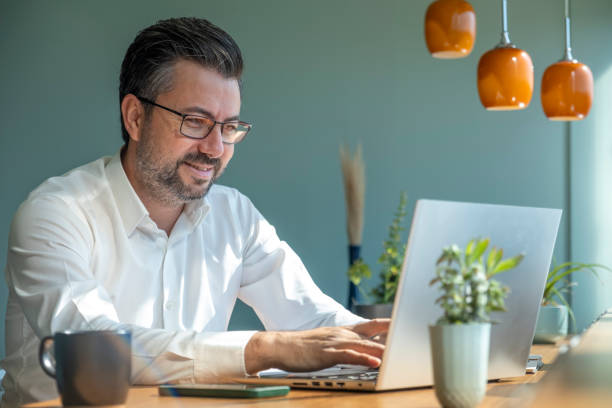 istock Businessman working with laptop in office 1422444194