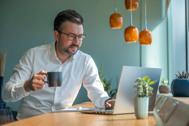 istock Businessman working with laptop in office 1422444198