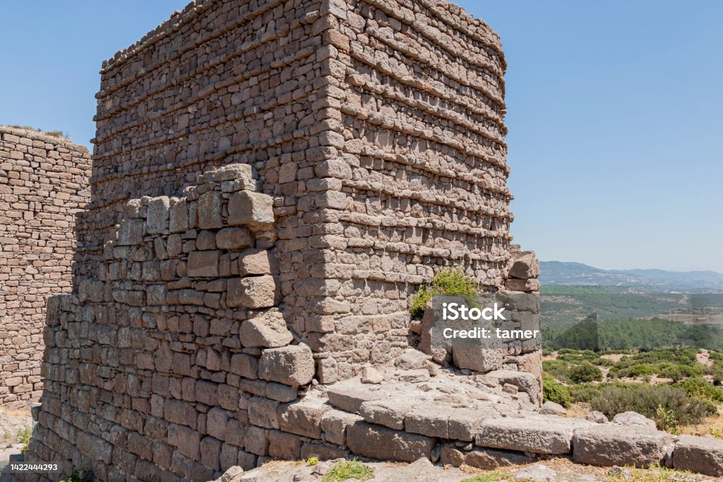 Assos ancient city The ruins of the ancient city of Assos are situated on a rocky hill, on the coast of the Aegean Sea in Turkey. Acropolis - Athens Stock Photo