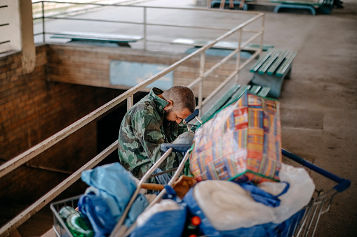 Kasumbalesa, Zambia - May 5, 2014: Men working in the loading and unloading of goods at the border crossing between Zambia and Democratic Republic of the Congo