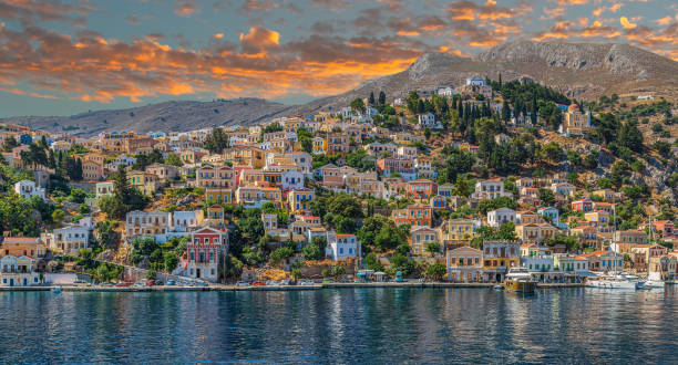 istock Symi harbour, Greece, with colorful neoclassical mansions 1422446558