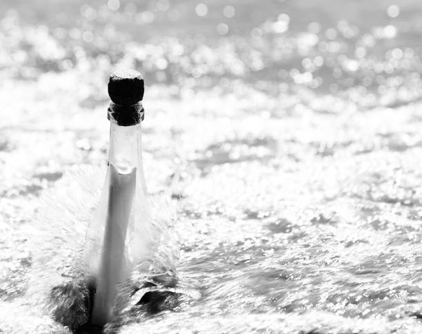 glass bottle with cap with black and white effect and very high brightness which makes the image very clear with a secret message inside