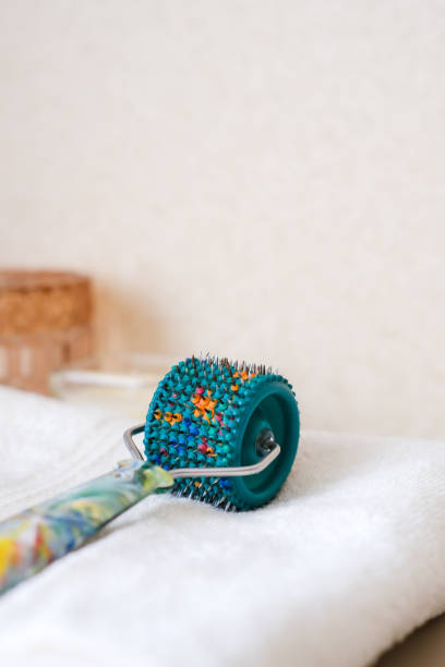 istock Applicator Lyapko on a linen towel. 1422451290