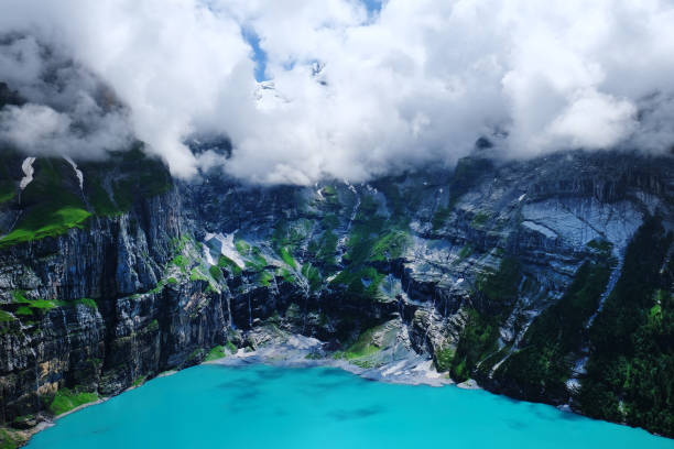 スイスアルプス探検 - european alps mountain beauty in nature oeschinen lake ストックフォトと画像