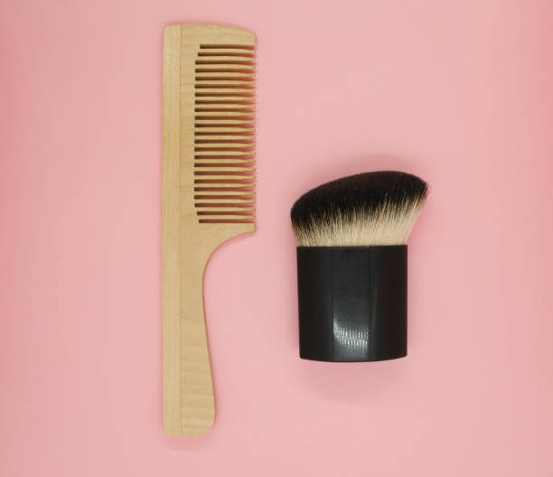 istock Wooden comb and cosmetic brush 1422464266