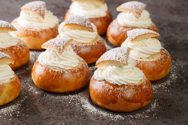 istock Traditional Swedish easter bun filled with almond paste and whipped cream closeup. Horizontal 1422465028