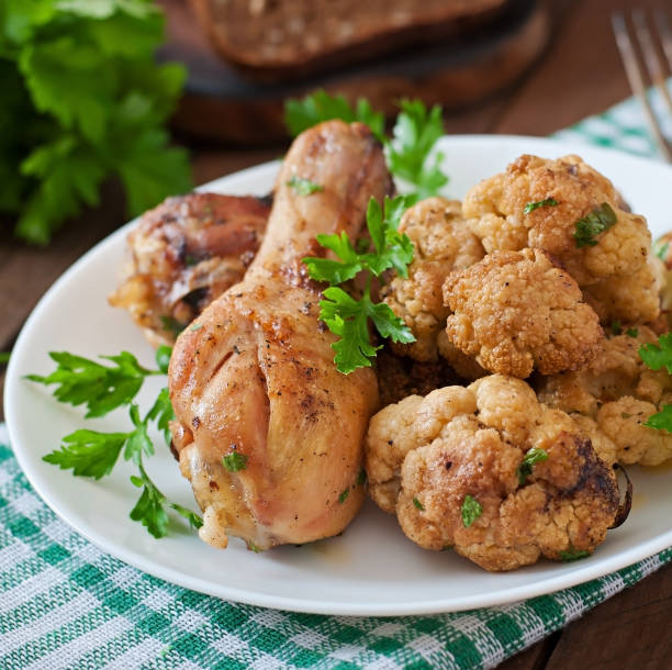 Chicken leg with baked cauliflower and parsley