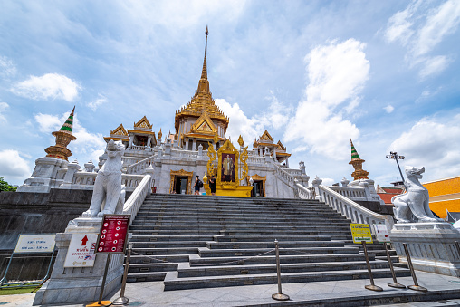 Bangkok, Thailand - September 11, 2019: facade of Wat Traimit Withayaram Worawihan with tourits