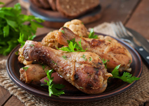 istock Chicken leg with baked cauliflower and parsley 1422479841