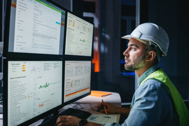 istock Man operator control process on product line uses industry 4.0 and digital technology on modern factory. Engineer follow assembly process uses SCADA system 1422487971