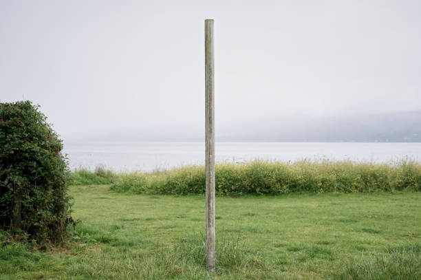 Old derelict wooden post at Lunderston Bay Inveclyde Scotland