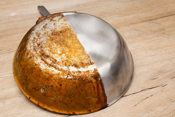 istock A frying pan that is half burnt and half polished 1422488706