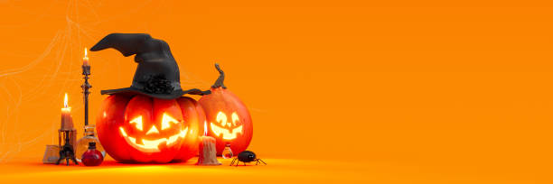 dos calabazas talladas sonrientes con decoración de halloween sobre fondo naranja - halloween pumpkin party carving fotografías e imágenes de stock