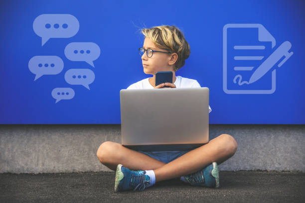 istock Boy communicate with laptop and smartphone. Analog versus digital technology. New tech concept. 1422492674