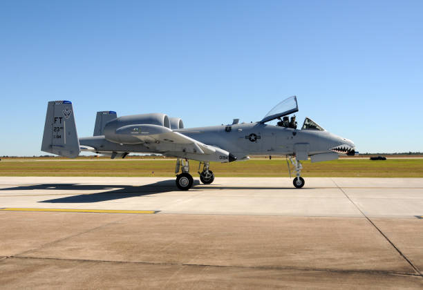 A-10 Warthog heavily armored airplane Houston, USA - November 1, 2009: A-10 Warthog airplane taxies for departure to its home base in North Carolina. The aircraft is designed for close support of ground attack forces. a10 warthog stock pictures, royalty-free photos & images