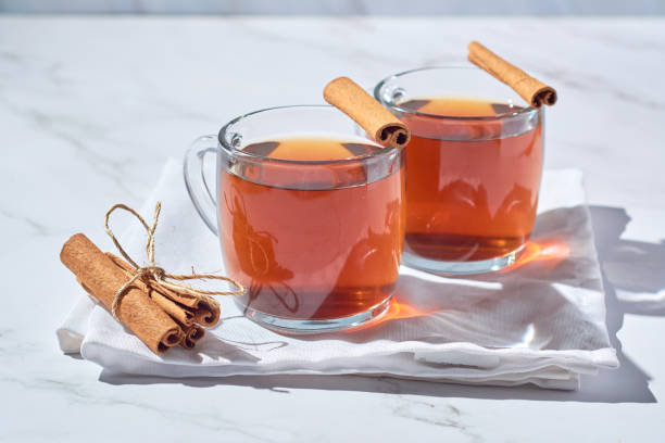 istock Steaming hot cup of tea with cinnamon 1422504402