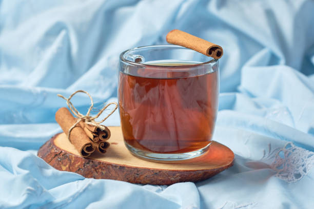 istock Steaming hot cup of tea with cinnamon 1422504404