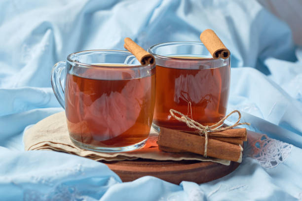 istock Steaming hot cup of tea with cinnamon 1422504427