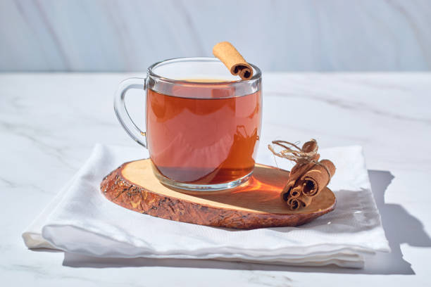 istock Steaming hot cup of tea with cinnamon 1422504793