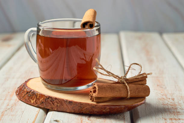 istock Steaming hot cup of tea with cinnamon 1422505901