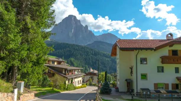 Santa Cristina Valgardena, town and commune in northern Italy, located in the Dolomites / Italy - August 29 2022: Santa Cristina Valgardena town and commune in northern Italy, situated in the Dolomites at an altitude of 1,428 m above sea level. in the Val Gardena valley, in the province of Bolzano, in the Trentino-South Tyrol region.