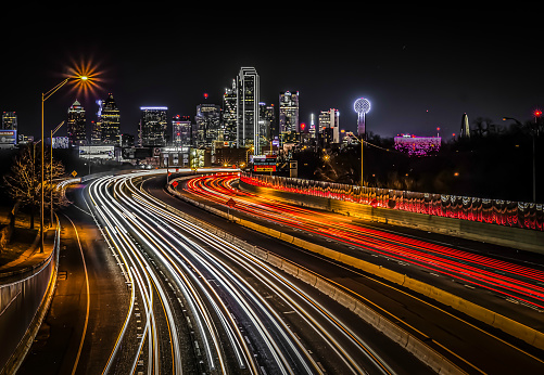 Dallas skyline with traffic in motion in a long exposure night shot