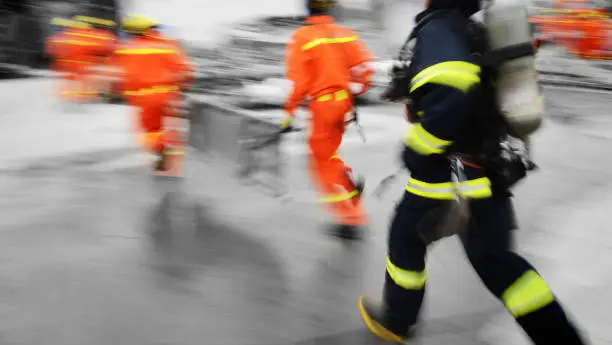 Search and rescue forces running to a destroyed building. blur motion