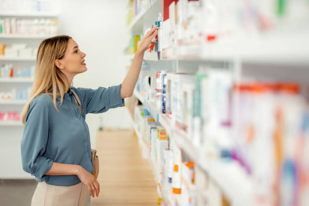 istock Female Customer in a Pharmacy 1422516962