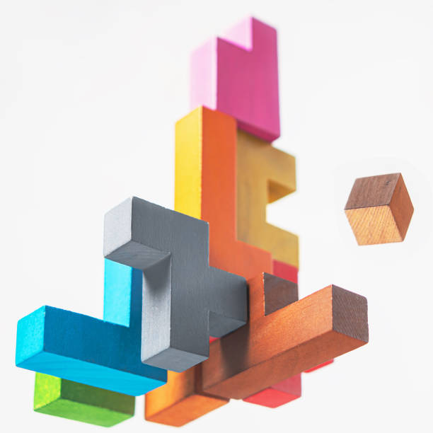 istock Abstract construction from wooden blocks. The concept of logical thinking. 1422520101