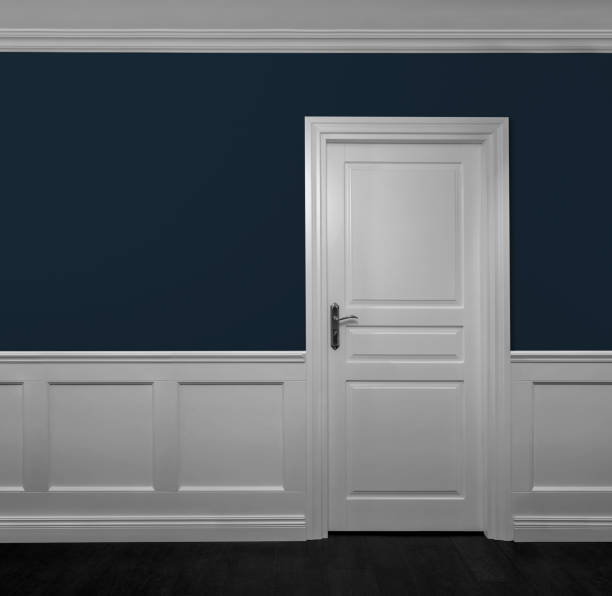 Elegant wooden door in empty room Elegant wooden door in empty room with copy space moulding door jamb wood stock pictures, royalty-free photos & images