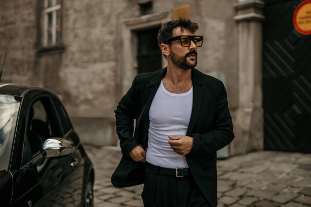 istock Fashionable man and a car 1422522604