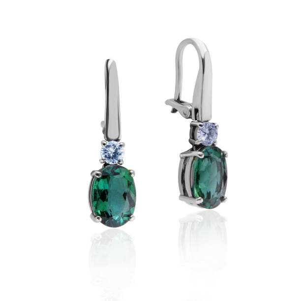 istock gold earrings with emeralds and diamonds 1422523405