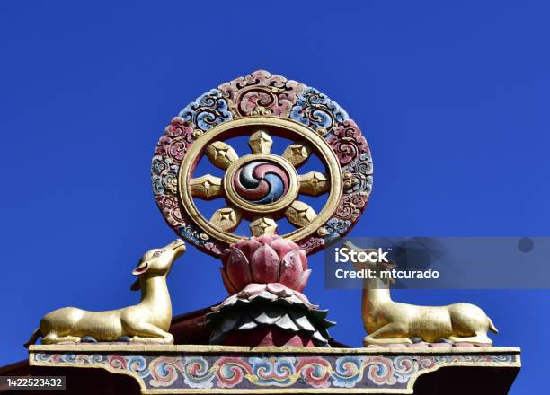 Dharwheel Flanked By Deer Thangthong Dewachen Dupthop Nunnery Thimphu Bhutan Stock Photo - Download Image Now