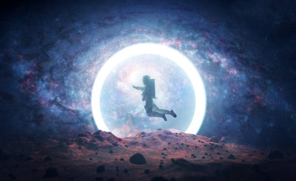 istock Astronaut on alien planet entering spacetime portal light 1422527544