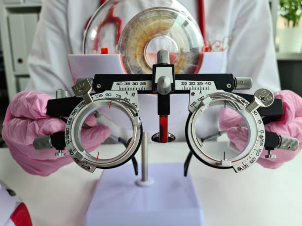 istock Ophthalmologist with trial frame for selection of complex glasses 1422547027