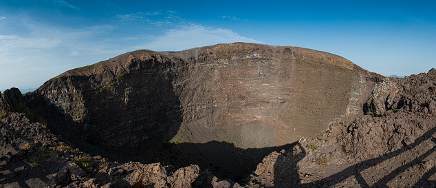 Neapel, Vesuv, Italy. Mount Vesuvius (Italian Vesuvio, Latin Vesuvius) is an active volcano on mainland Europe. It is located on the Gulf of Naples in the Italian region of Campania, nine kilometers from the city of Naples.\n\nThe eruption of Mount Vesuvius in AD 79 destroyed the Roman cities of Pompeii, Herculaneum, Oplontis and Stabiae, as well as several other settlements.