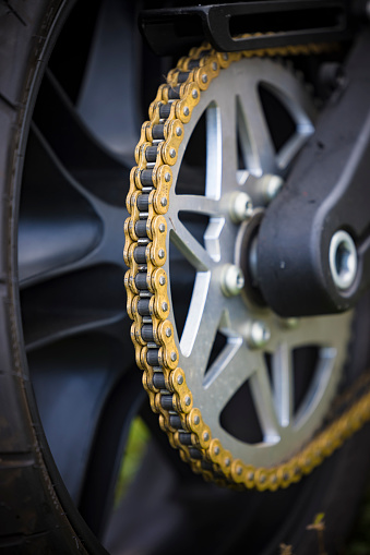 motorcycle golden chain close-up.