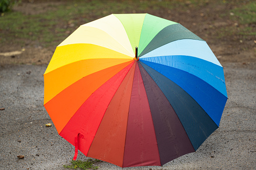 colorful umbrella in the rain on the street