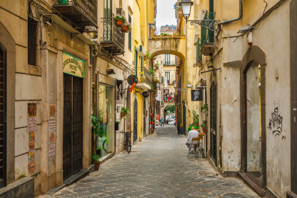 a narrow, rustic and colourful alley in the centre of salerno, italy - salerno imagens e fotografias de stock