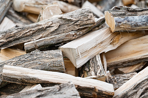 background of chopped firewood, close-up